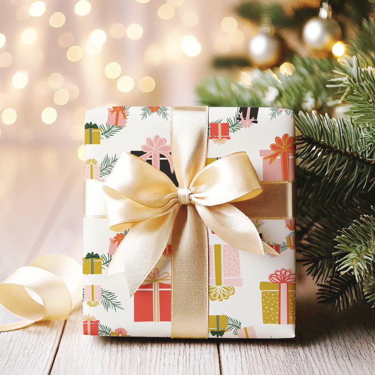 Image of a wrapped gift featuring an original hand drawn wreath and gift box Christmas themed repeating pattern. The design is part of Christmas 2024 great giveaway!