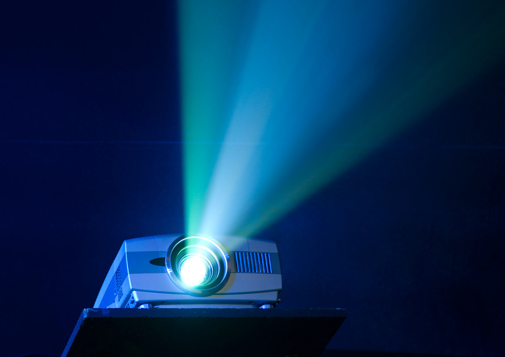 An image of an outdoor projector on a table.