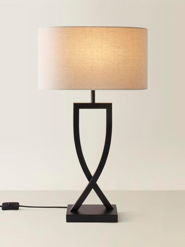 Image of a Black Metal Table Lamp with Oatmeal Lampshade. Available to buy from Amazon.