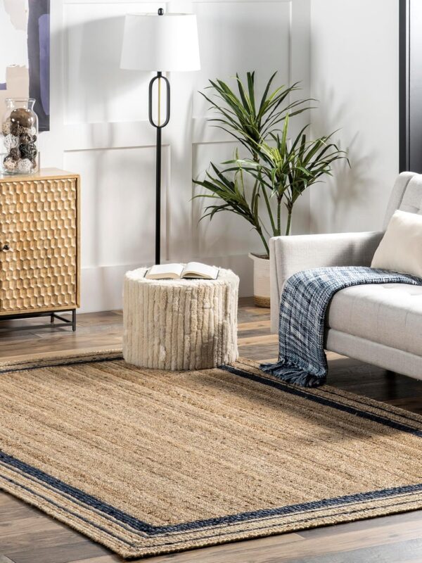 An image of a living room setting featuring the Braided Jute Rug. Available to buy from Amazon